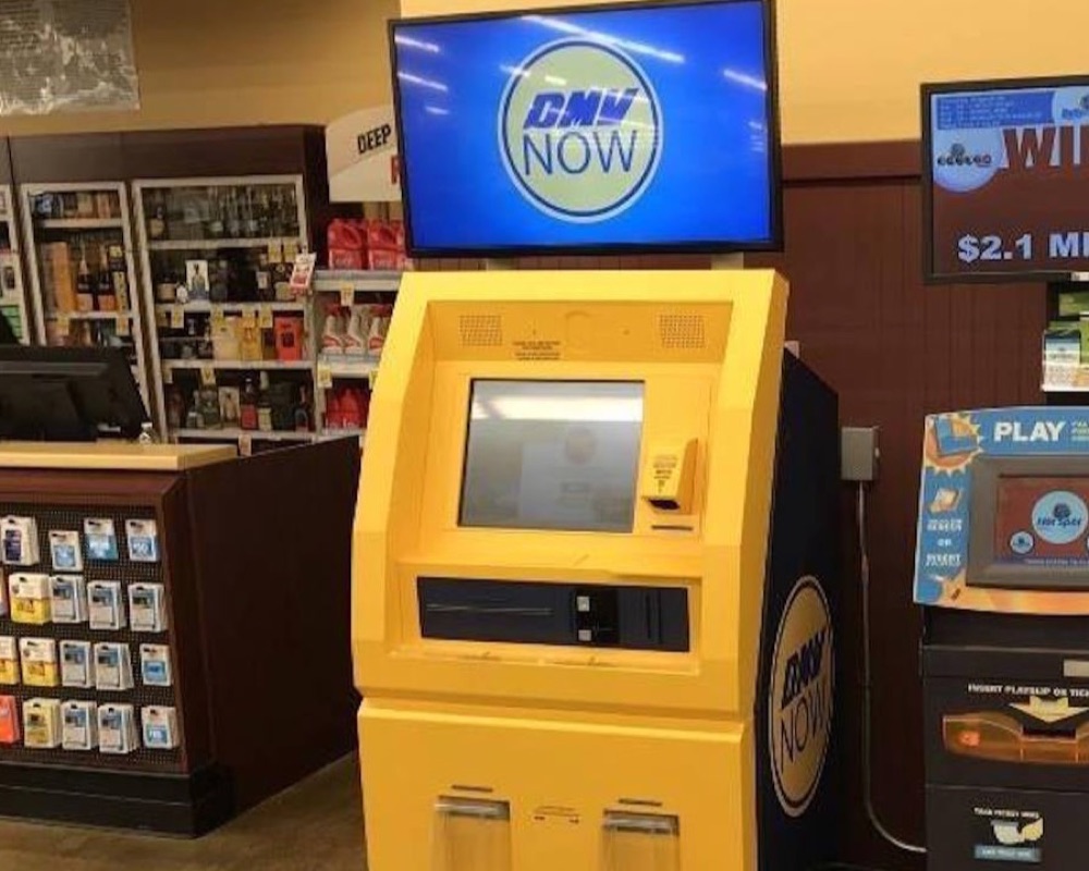 Self-service DMV-style kiosk inside a grocery store